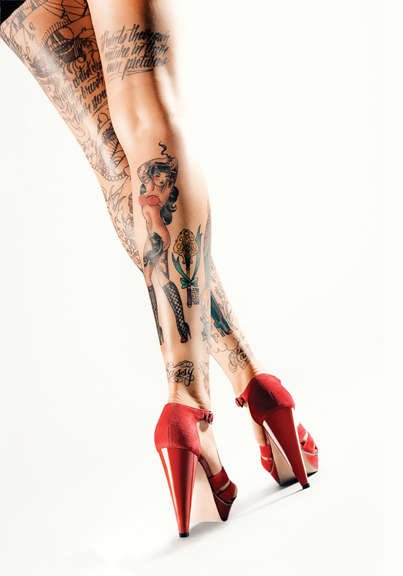 Татуировки на красивом женском теле