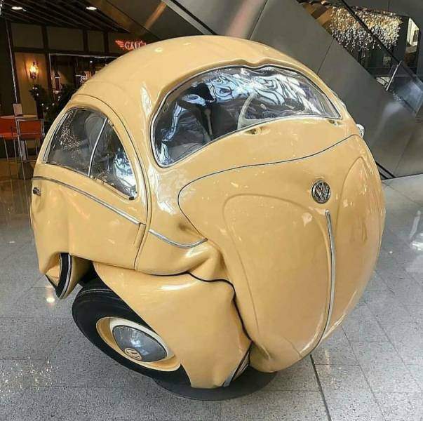 Скульптура шар из автомобиля