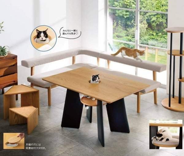 В Японии выпустили специальный кухонный стол с отверстием для кота, чтобы тот мог стать полноценным участником трапезы