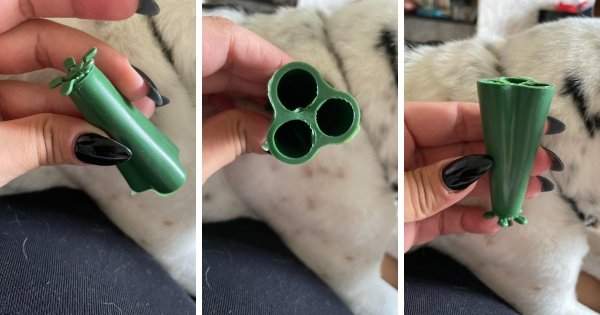 Зелёная резиновая штучка с тремя дырками