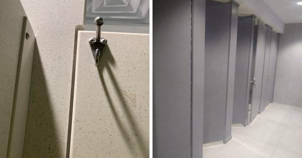 Дверцы кабинок в этом рабочем туалете размером от пола до потолка, а в промежутках нет щелей, через которые всё видно