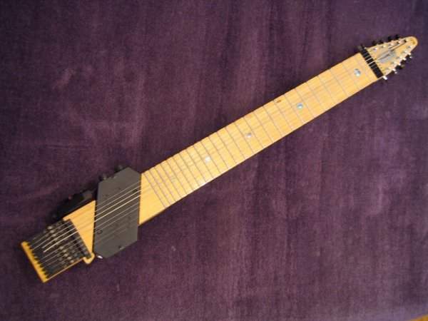 Стик — струнный музыкальный инструмент со звукоснимателями, разновидность электрогитары